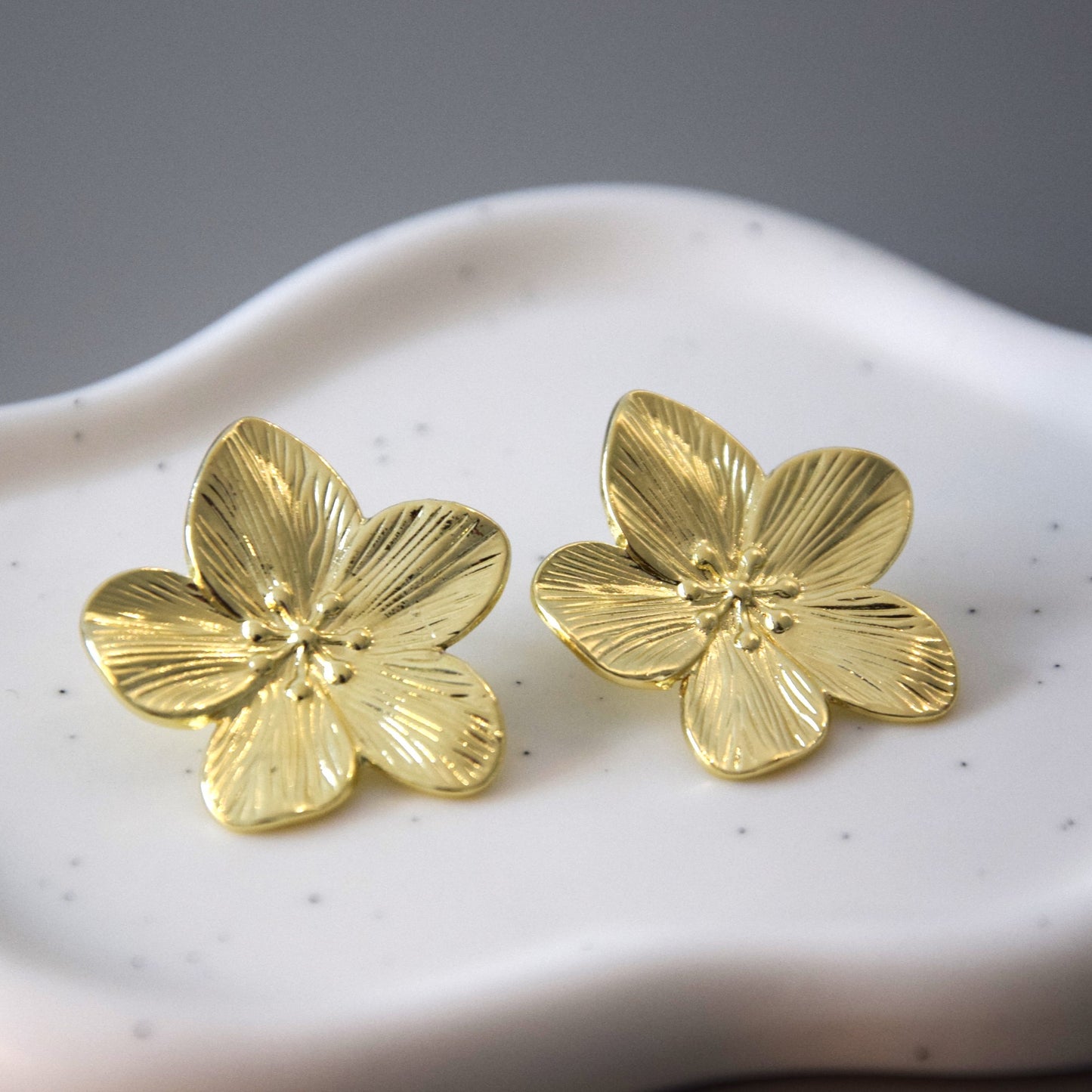 Boucle d'oreille fleurs