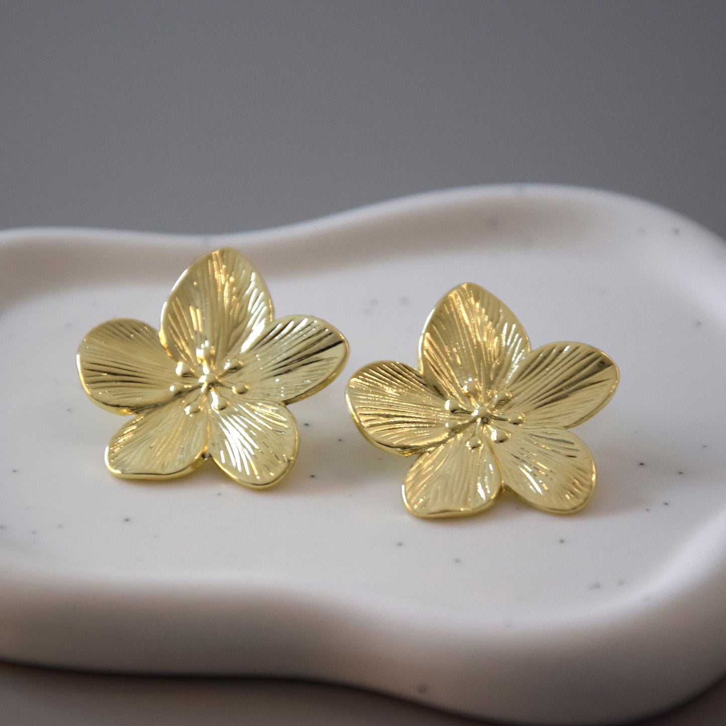 Boucle d'oreille fleurs