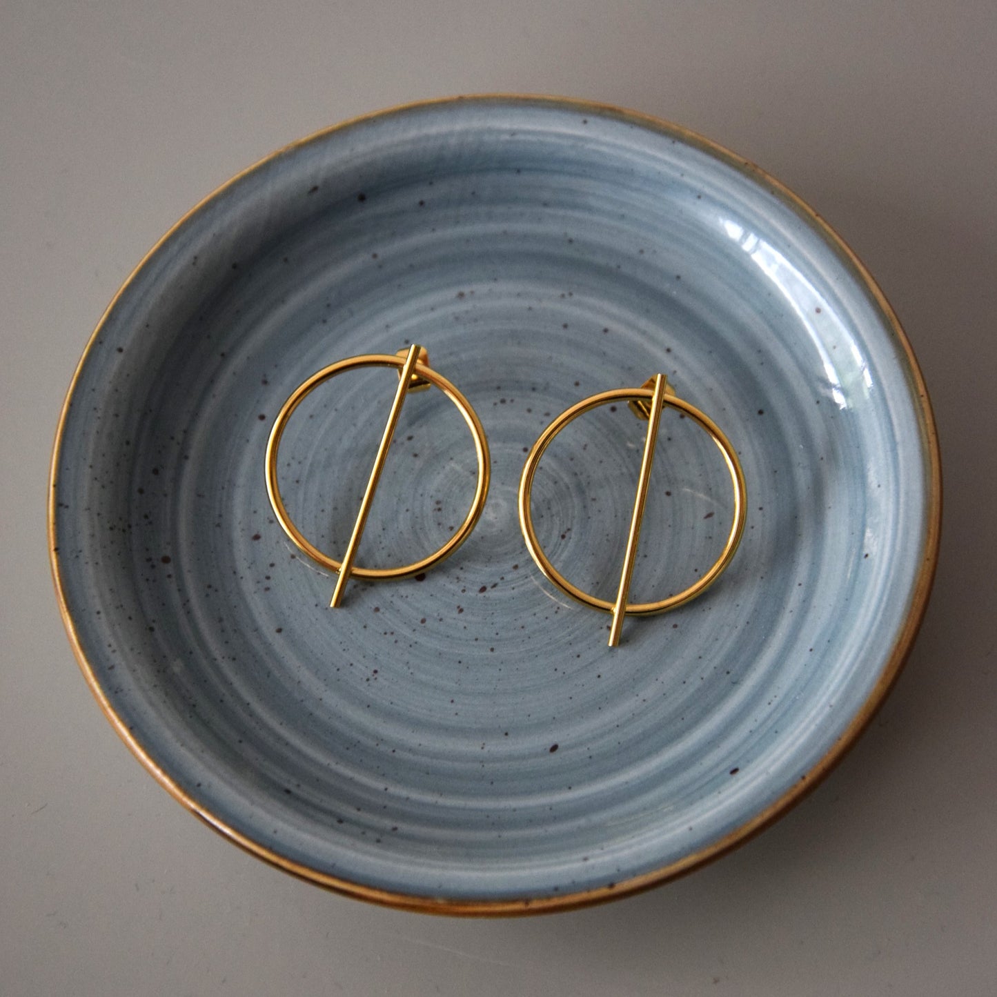 Boucle d'oreille design ronde