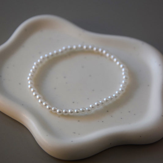 Bracelet perles blanches 4mm
