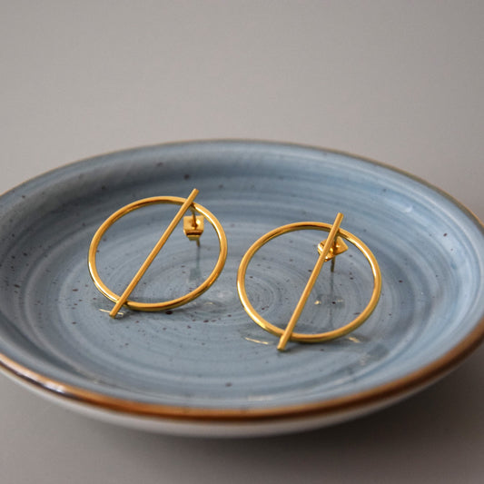 Boucle d'oreille design ronde